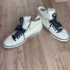Diesel high top fashion leather sneakers.